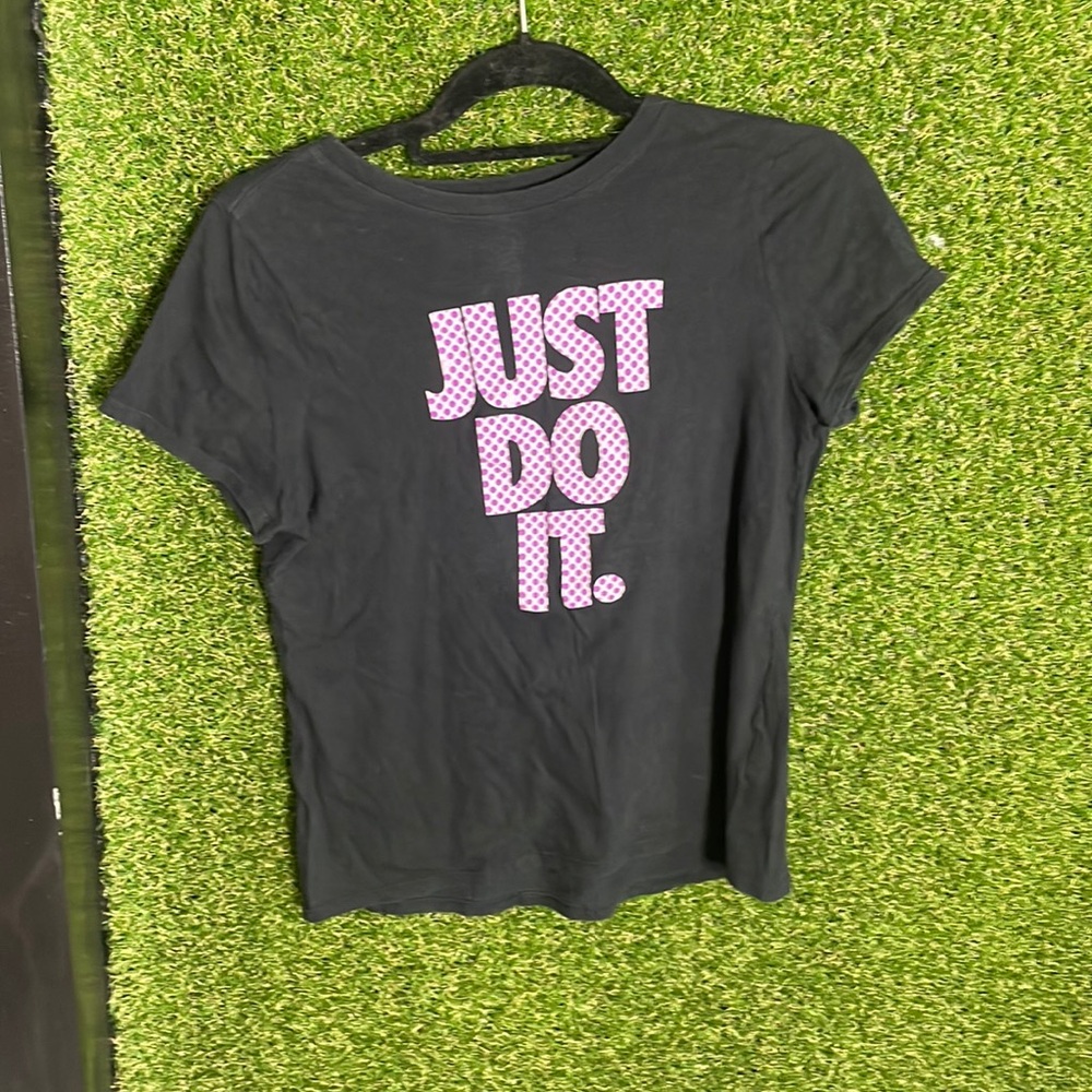 Brand is Nike size is extra large the color is black, purple, and white.